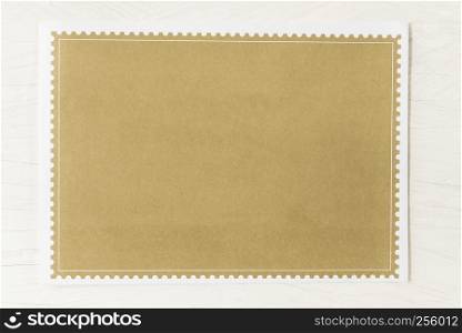 Empty brown paper on white table background.