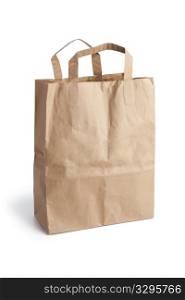 Empty brown paper shopping bag on white background