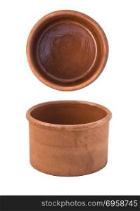 empty ceramic pot is isolated on white background, close up . empty ceramic pot