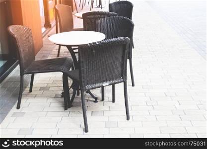 Empty coffee and restaurant terrace with classic style tables and chairs, Sunset time