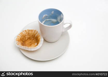 Empty coffee cup and wrapper