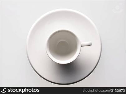Empty coffee cup on a saucer