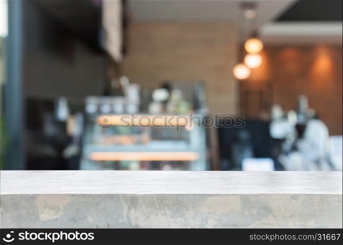 Empty concrete table top with blurred coffee shop, stock photo