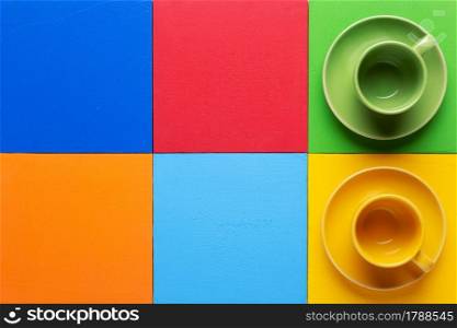 Empty cup of coffee at colorful abstract background texture. Coffee break time concept