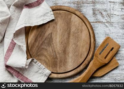 Empty cutting board on kitchen table