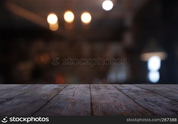 Empty dark wooden table in front of abstract blurred background of cafe and coffee shop interior. can be used for display or montage your products - Image