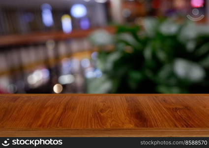 Empty dark wooden table in front of abstract blurred background of restaurant, shopping mall interior. can be used for display or montage your products - Image 