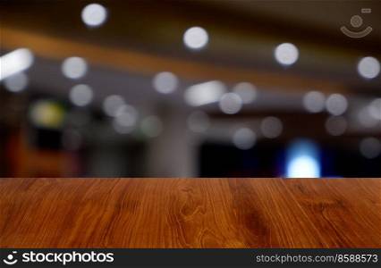 Empty dark wooden table in front of abstract blurred background of restaurant, shopping mall interior. can be used for display or montage your products - Image 