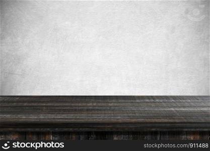 Empty dark wooden table over gray cement wall, vintage, background, template, product display montage