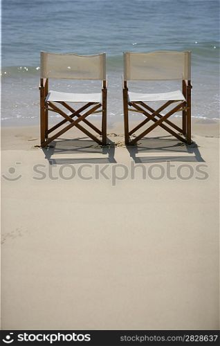 Empty deckchairs on a beach