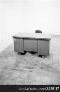 Empty Desk In A White Room
