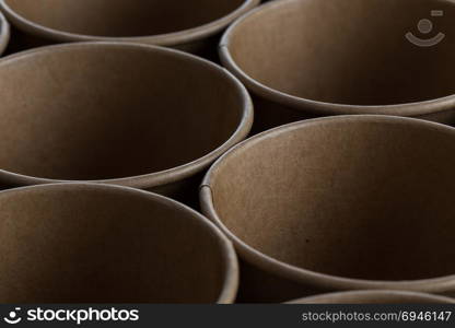 Empty disposable paper coffee cups for background