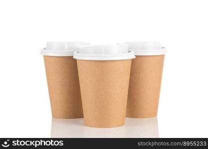 Empty disposable paper coffee cups isolated on white background