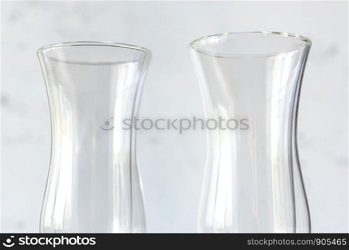 Empty double wall glasses isolated