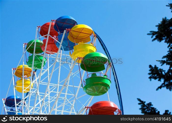 Empty Ferris wheel in the park solar day