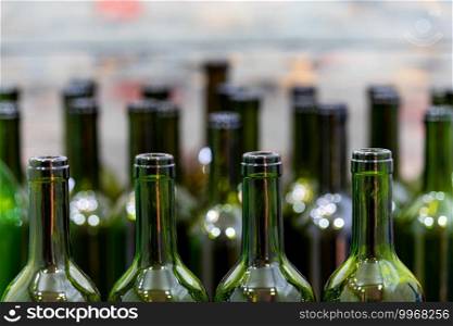 Empty foreground bottles of colors and alcohol for decoration