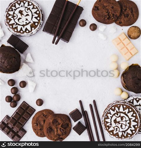 empty frame made with chocolates products white background