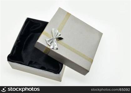 Empty gift box with small gray fabric tape with gray tie