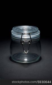 Empty glass jar with closed cap