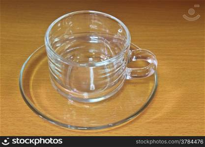 Empty glass tea cup on table wood