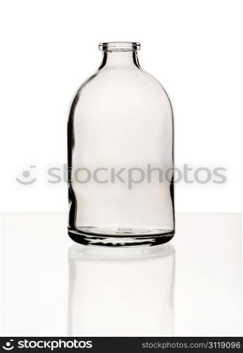 Empty glass vial, isolated on a white background.