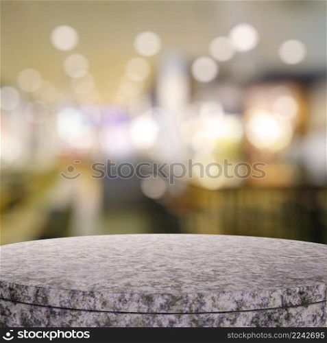 Empty granite round table and blurred background for product presentation