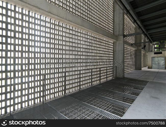 Empty gray concrete corridor
