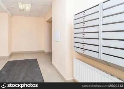 Empty hall mailboxes and doors at new apartment building. hall mailboxes and doors