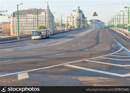 empty highway in the city center and the lone trolley