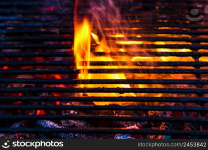 Empty hot charcoal barbecue grill with bright flame