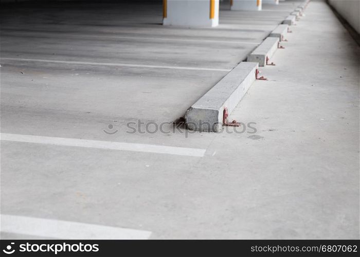 empty indoor car parking lot in building