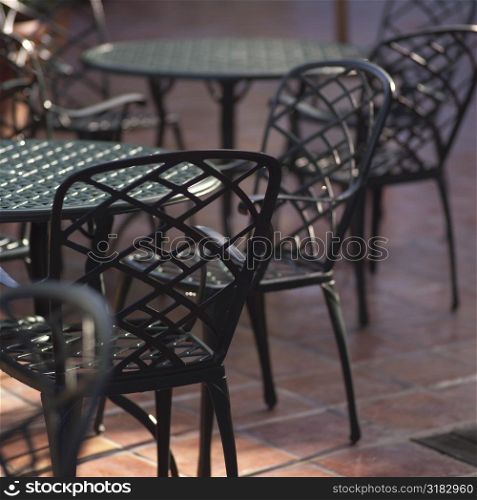 Empty iron tables and chairs