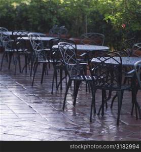 Empty iron tables and chairs