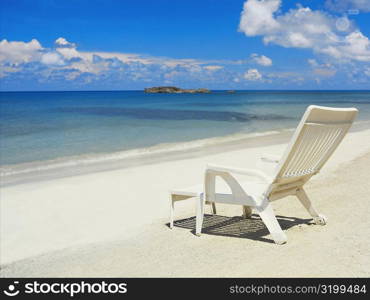 Empty lounge chair on the beach, South West Bay, Providencia, Providencia y Santa Catalina, San Andres y Providencia Department, Colombia