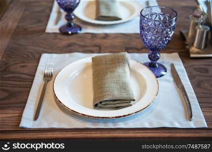 Empty luxury dish on table in restaurant.. Empty dish on table in restaurant.