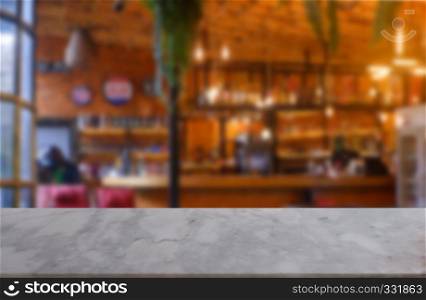 Empty marble stone table in front of abstract blurred background of restaurant, cafe and coffee shop interior. can be used for display or montage your products - Image