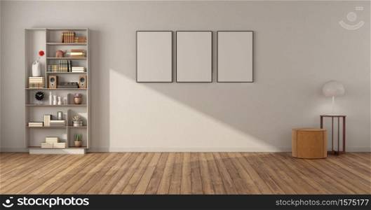 Empty minimalist living room with bookcase hardwwod floor and white wall - 3d rendering. Minimalist living room with bookcase