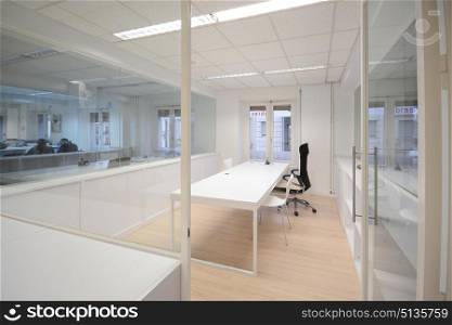 Empty modern office with white furniture