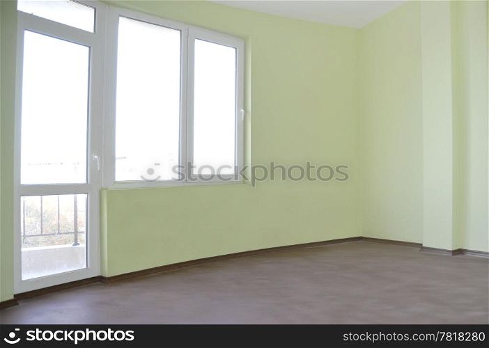 Empty newly painted room in a new constructed building