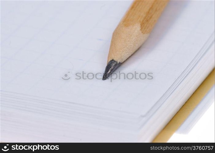 empty notebook and pencil isolated on white background