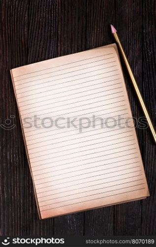 empty notebook on the wooden table, notebook on a table