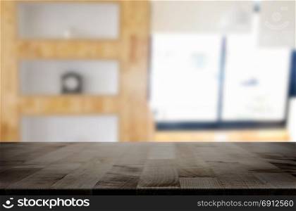 Empty of wood table top on blur of window glass in the morning background. for your photomontage or product display