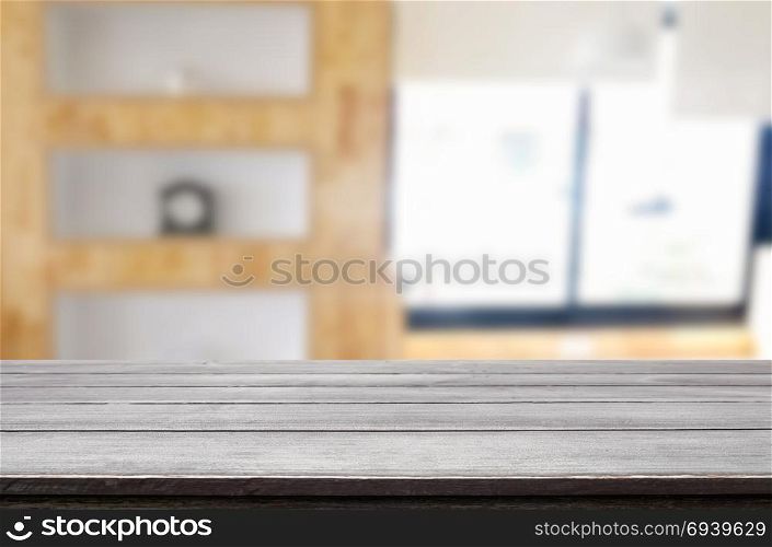 Empty of wood table top on blur of window glass in the morning background. for your photomontage or product display