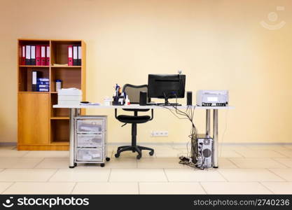 Empty office working place with computer, web camera and space for your text