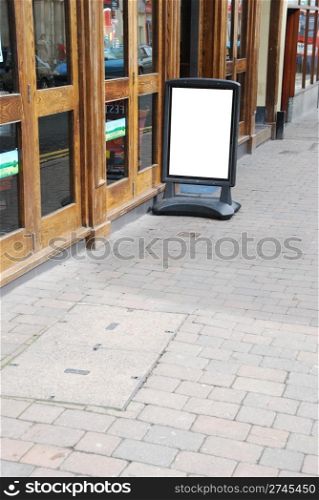 empty outdoor restaurant/pub menu in a british downtown street