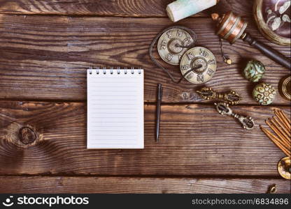 Empty paper notebook and Tibetan religious musical instruments for alternative medicine