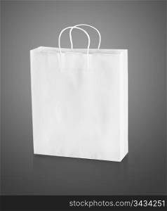 Empty paper shopping bags on a white background.
