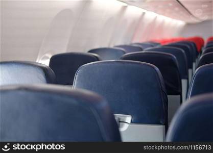 empty passenger seat inside airplane. row of chair in aircraft