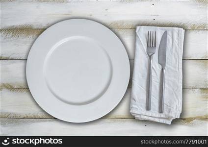 Empty plate and cutlery on olive-white wooden background.. Empty plate and cutlery on olive-white wooden background
