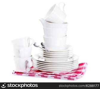 empty plates and cups on white background